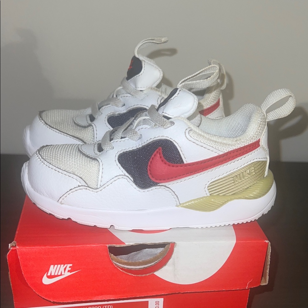 Nike Kids White and Gold Sneakers with Red Swoosh